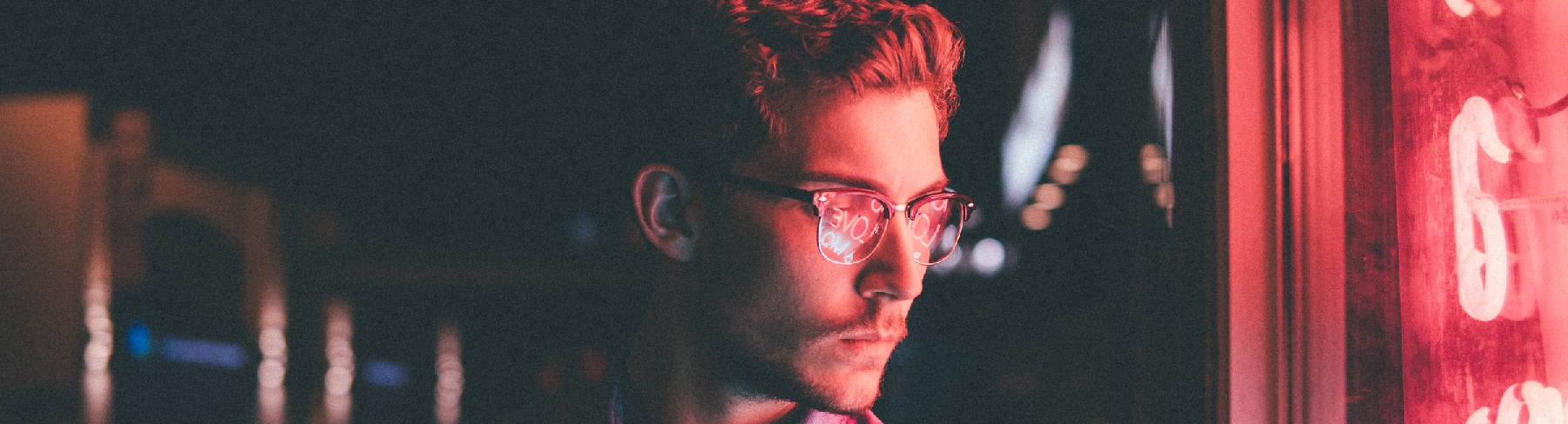 Man looking out of window