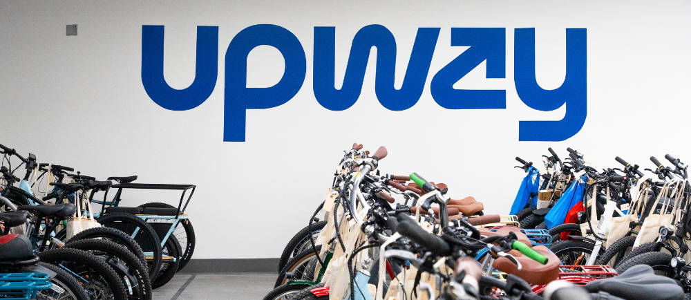 Upway UpCenter logo and ebike inventory