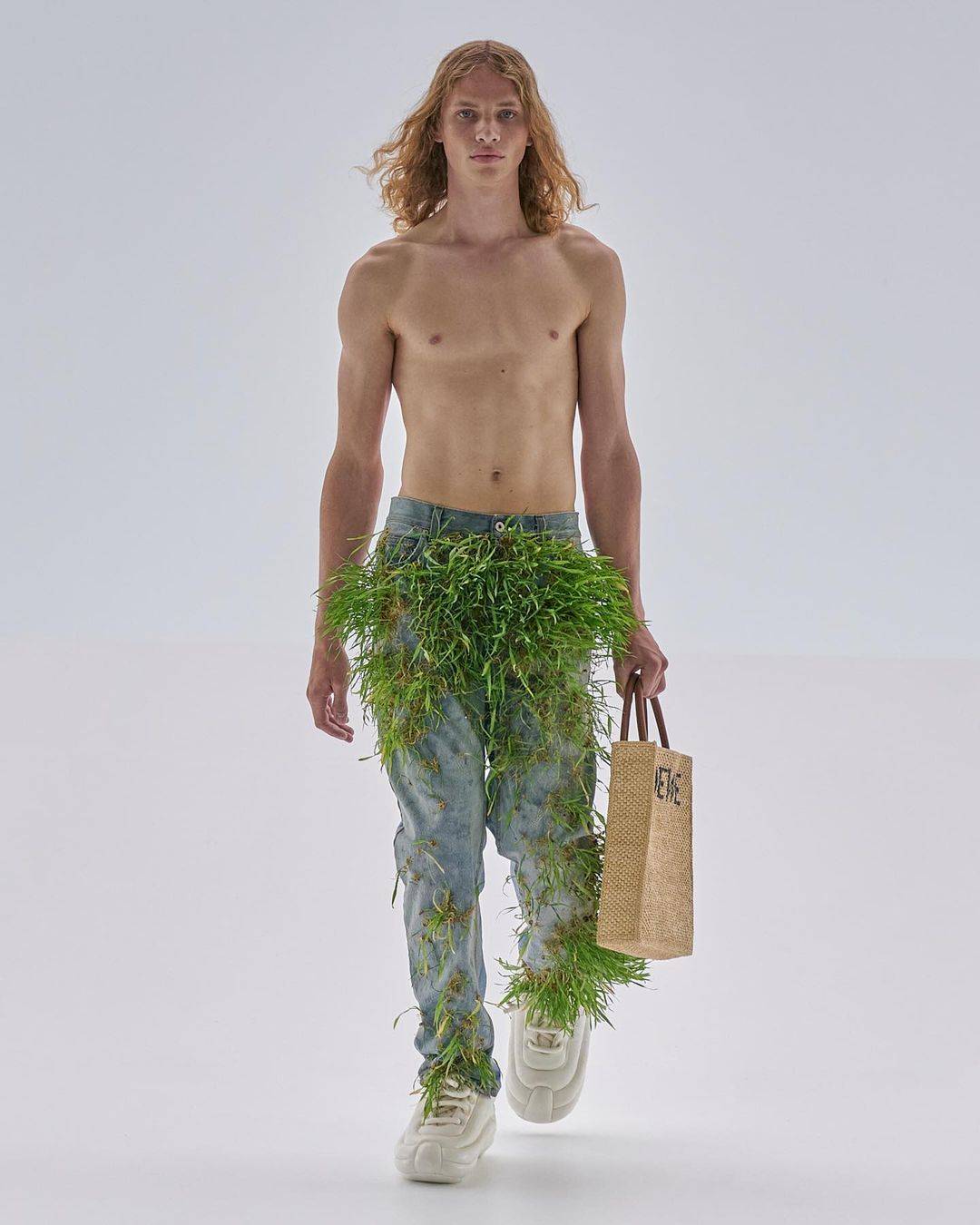 Jonathan Anderson, the creative director for Loewe, designed a collection that fuses technology and nature, showcasing garments that feature living plants
