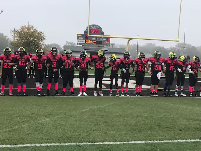 Ducks Pink Uniform Team Photo