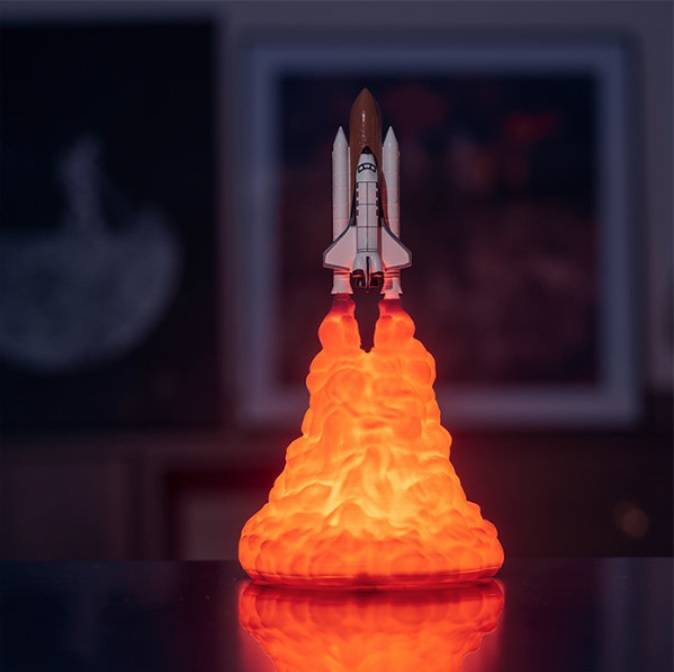 a unique 3D rocket night light with Charming warm light is one of the coolest toys for men