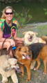female-with-dogs-at-lake