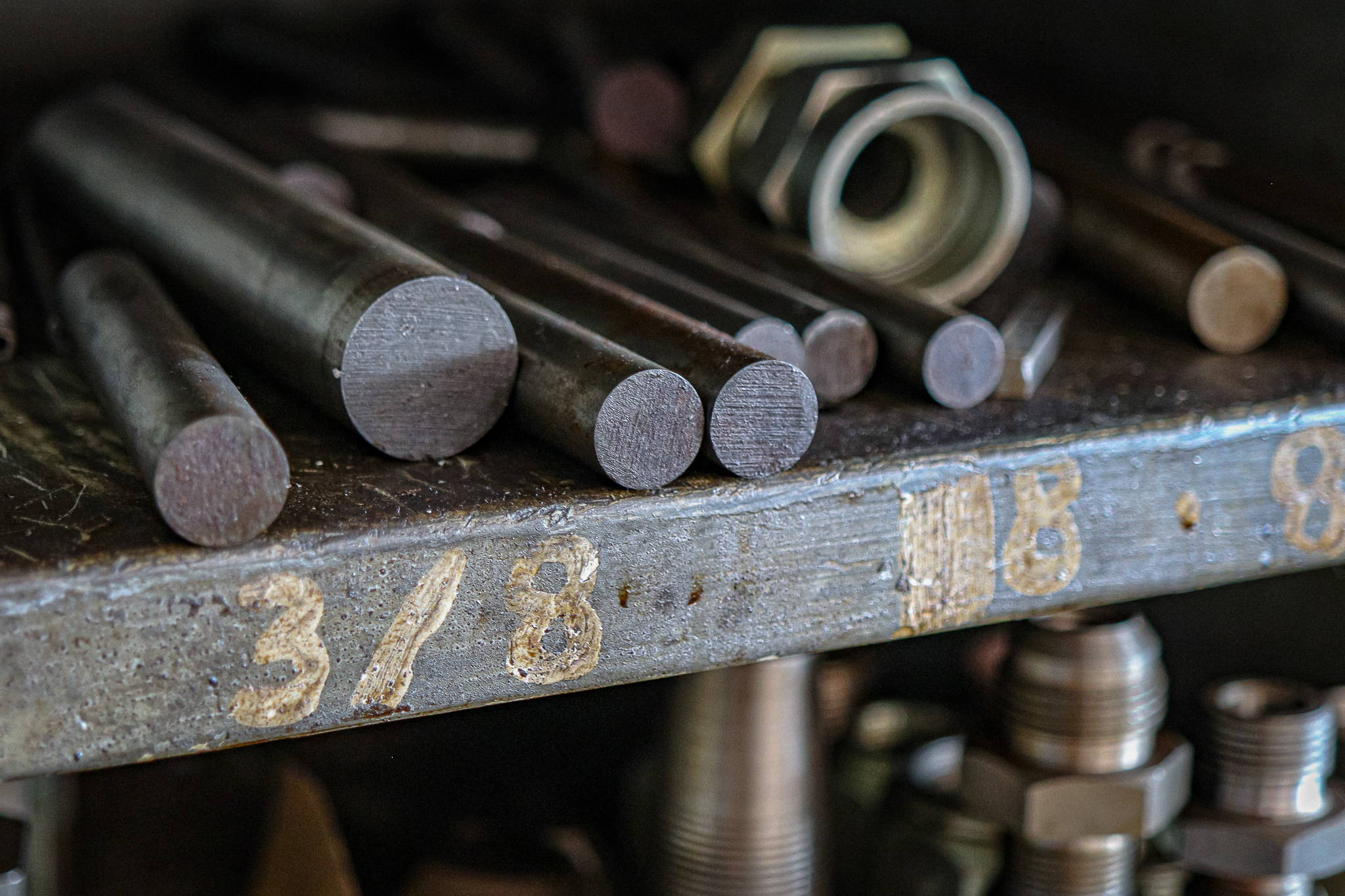 A shelf of metal stock ready for machining. 