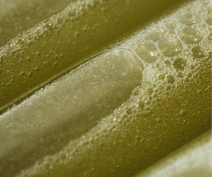 Close-up of DELTA BrainLuxury liquid in bottles