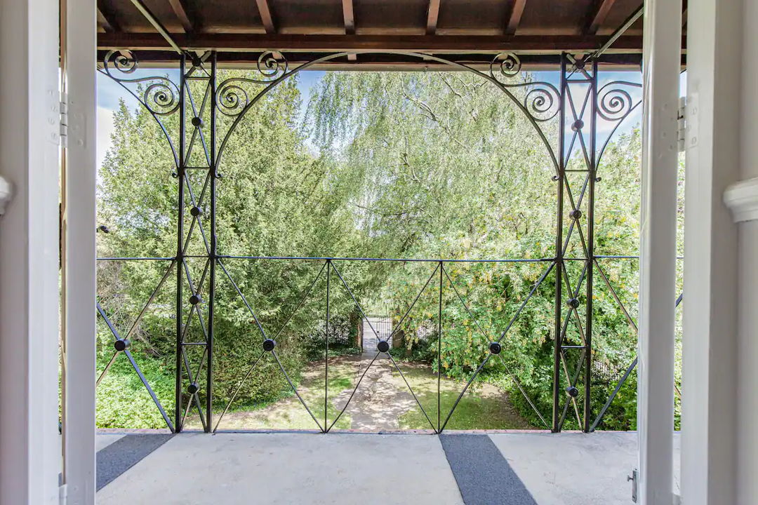 View from the apartment facing a green and pleasant path