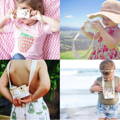 Four little girls posing and taking pictures with their Montessori Wooden Cameras.