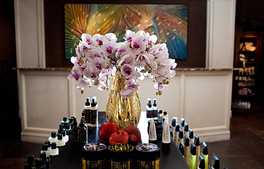 Delmonte spa entry piece with orchids taken by Tammy Swales Photography