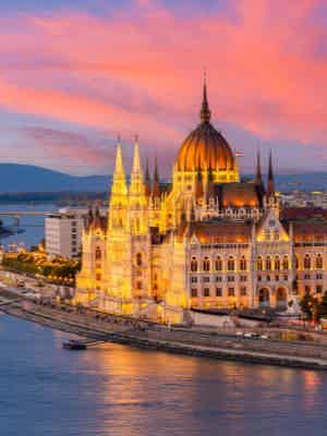 Sunset cruise with illuminated city views