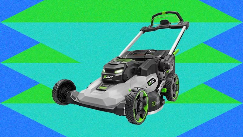 Image may contain: Grass, Lawn, Plant, Device, Lawn Mower, Tool, Machine, and Wheel