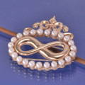 a new brooch made from old jewellery in remembrance of a dear husband