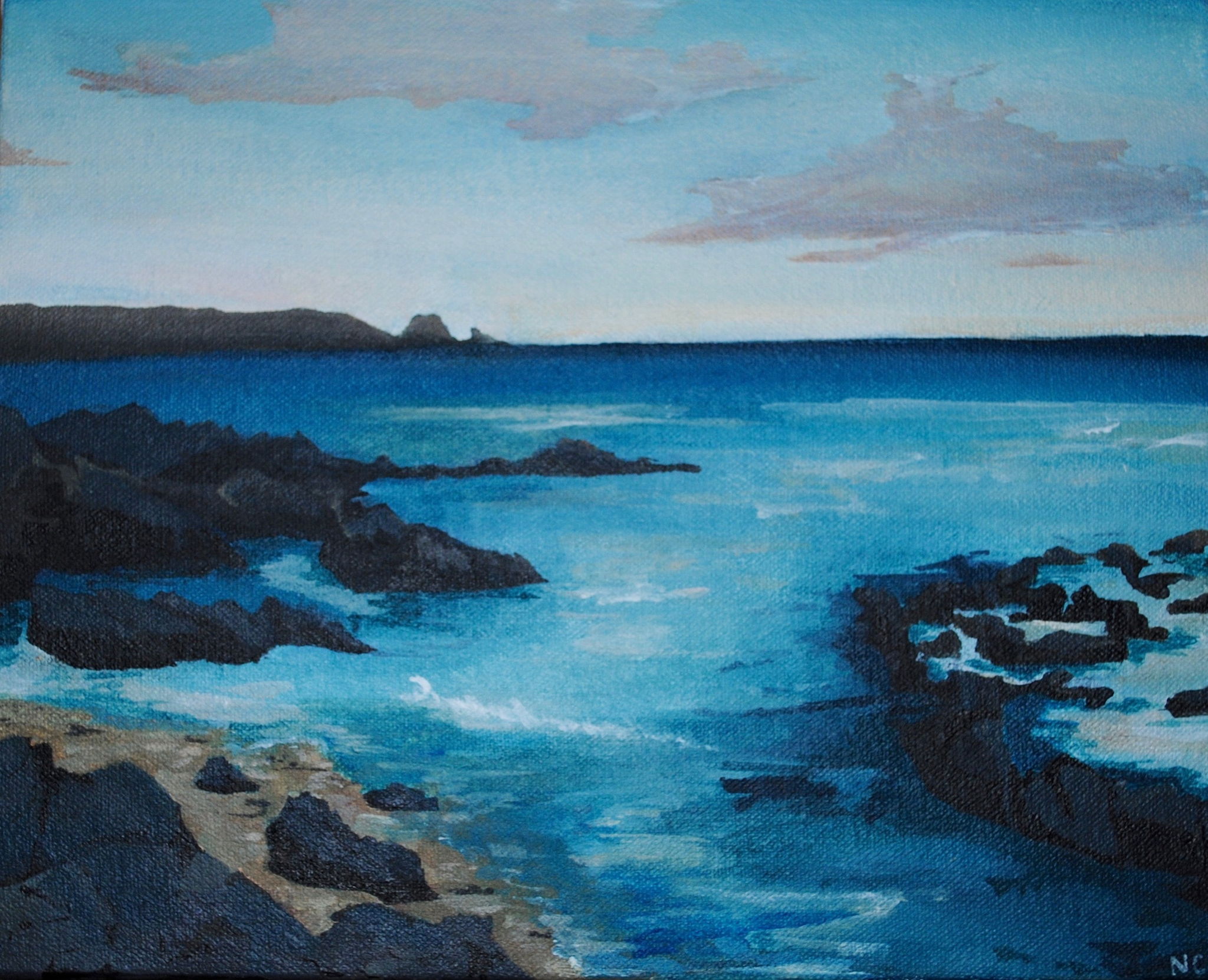 Shoreline with rocks and blue sea