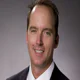 Scottrade is ramping up marketing -- with an interim leader at the helm