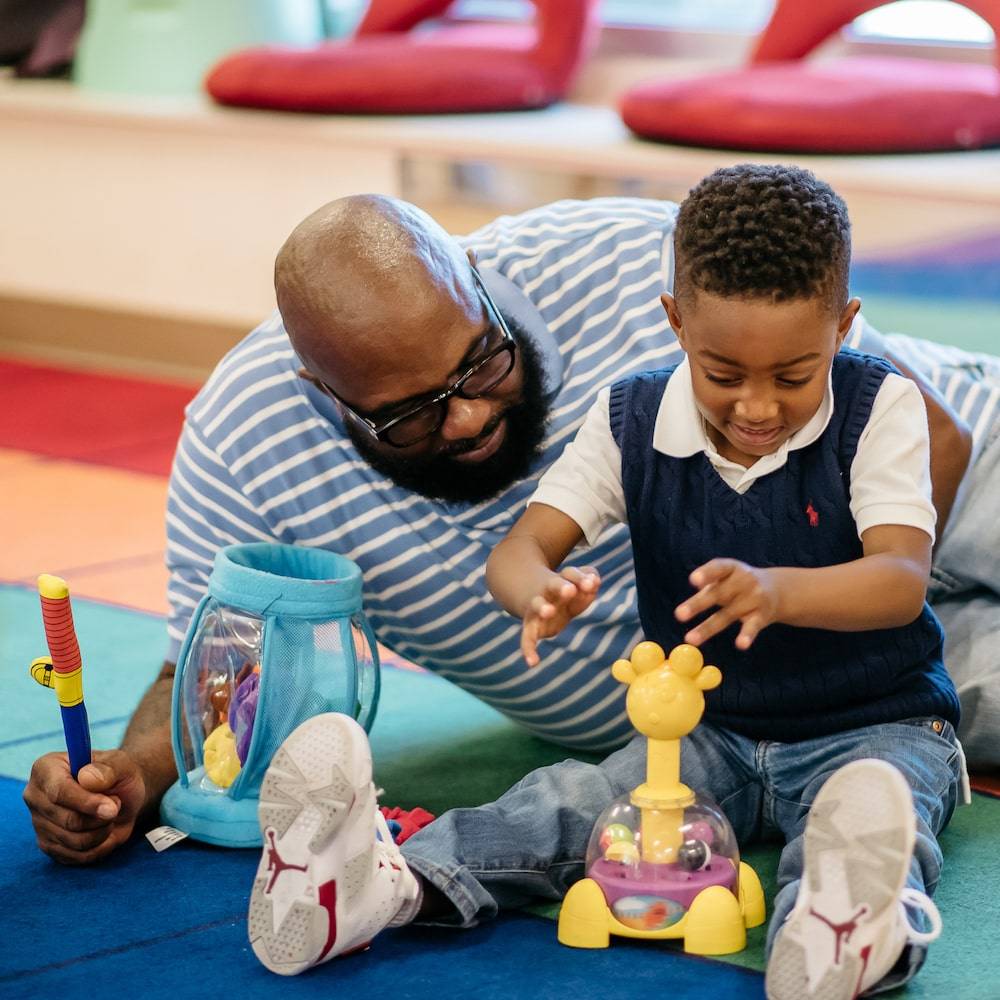 A father and son playing together