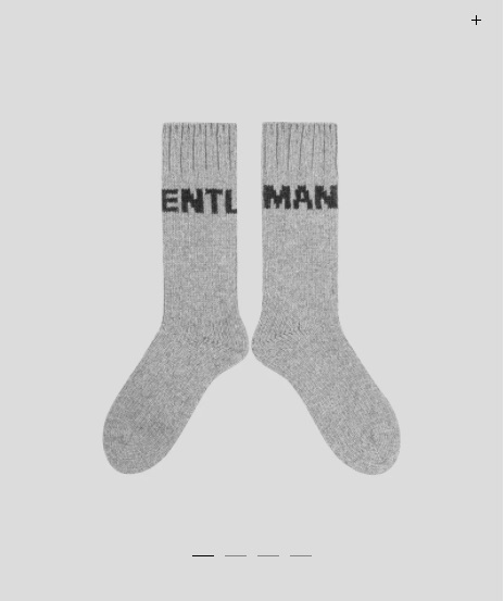 a pair of socks knitted in a warm and comfortable mix of wool and polyamide, embroidered "gentleman" letter is the greatest gift for your brother