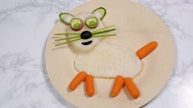 Cat made out of different vegetables