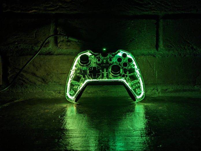 bigbig won rainbow rgb controller green rgb beside a brick wall