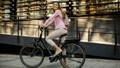 woman on an electric city bike