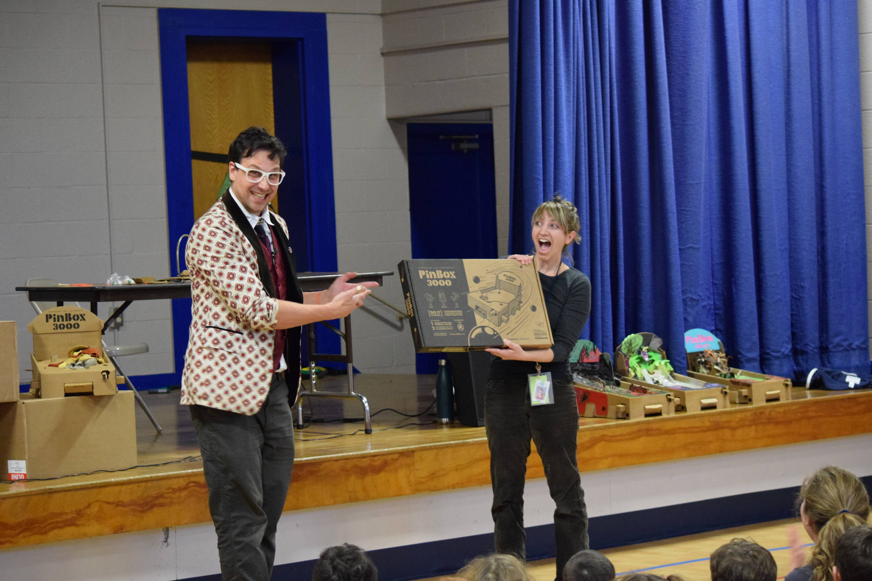 Ben gives art teacher Miss Blain a PinBox 3000.