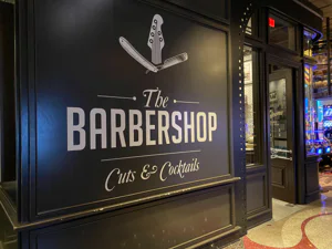 Live music stage at The Barbershop Cuts and Cocktails