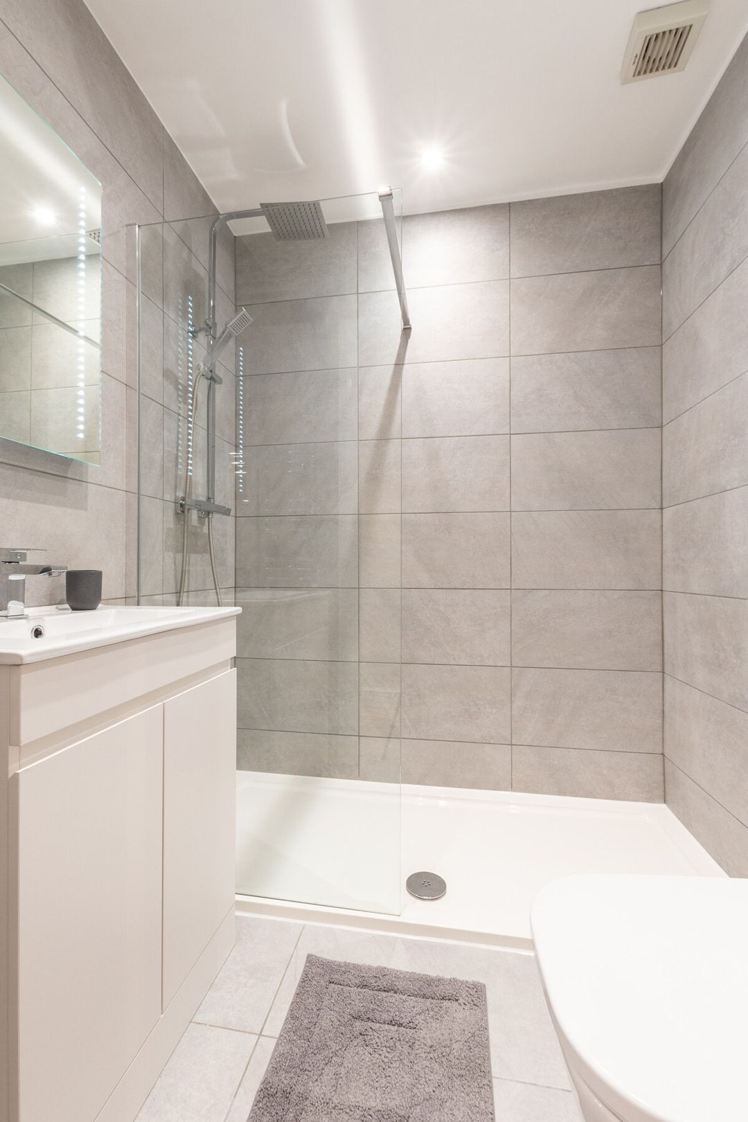 Bathroom showing waterfall shower