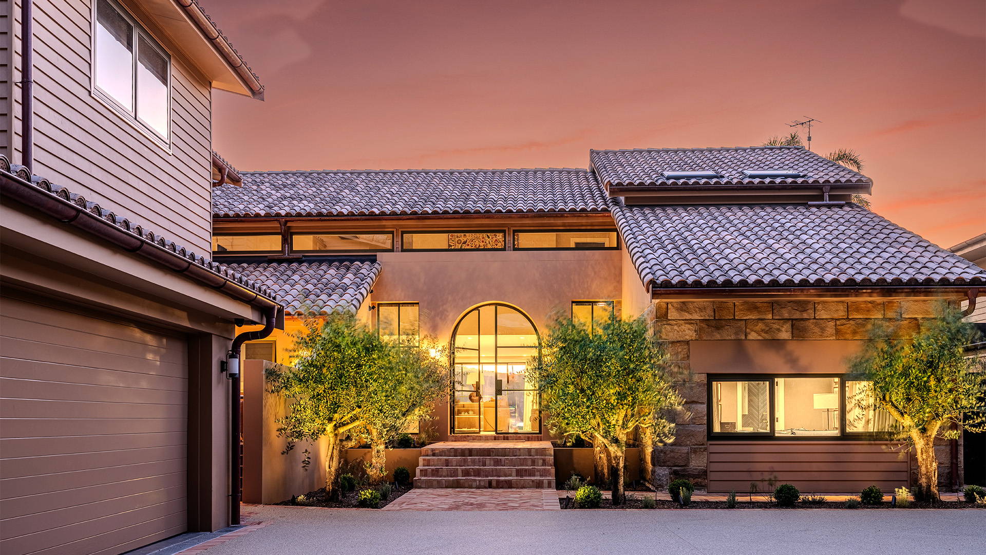 Havit Lighting - Outdoor Lighting by Havit  - Wall Lighting - Garden Lighting by Havit - Palm Beach beach house front door lit up at dusk time