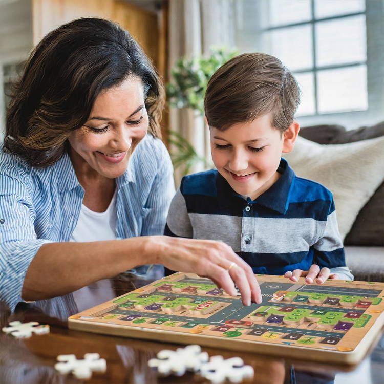 Mother and son playing with the Montessori Alphabet Parking Maze.