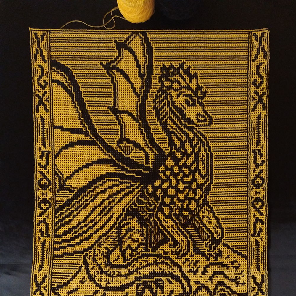 Boek Draak; In elkaar grijpende gehaakte deken