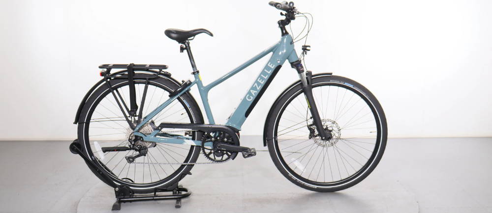 a blue Gazelle electric city bike