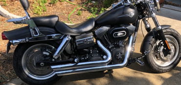 2011 HARLEY-DAVIDSON FXDF DYNA FAT BOB (BLACK) motorcycle for rent near Austin, TX