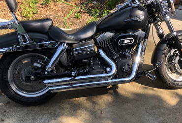 2011 HARLEY-DAVIDSON FXDF DYNA FAT BOB (BLACK) motorcycle for rent near Austin, TX