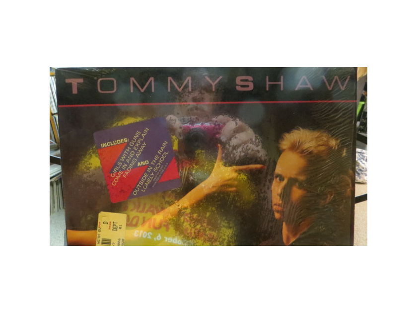 TOMMY SHAW - GIRLS WITH GUNS SHRINK STILL ON COVER