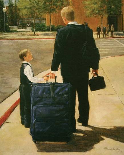 A little brother helps a new missionary pull his suitcase.
