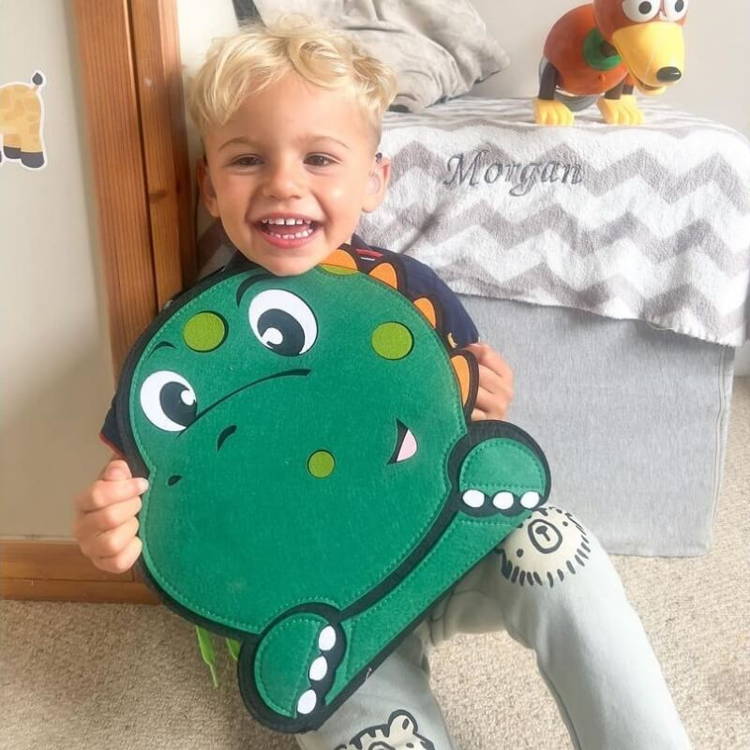 Montessori Dino Busy Board interactive children's toy.