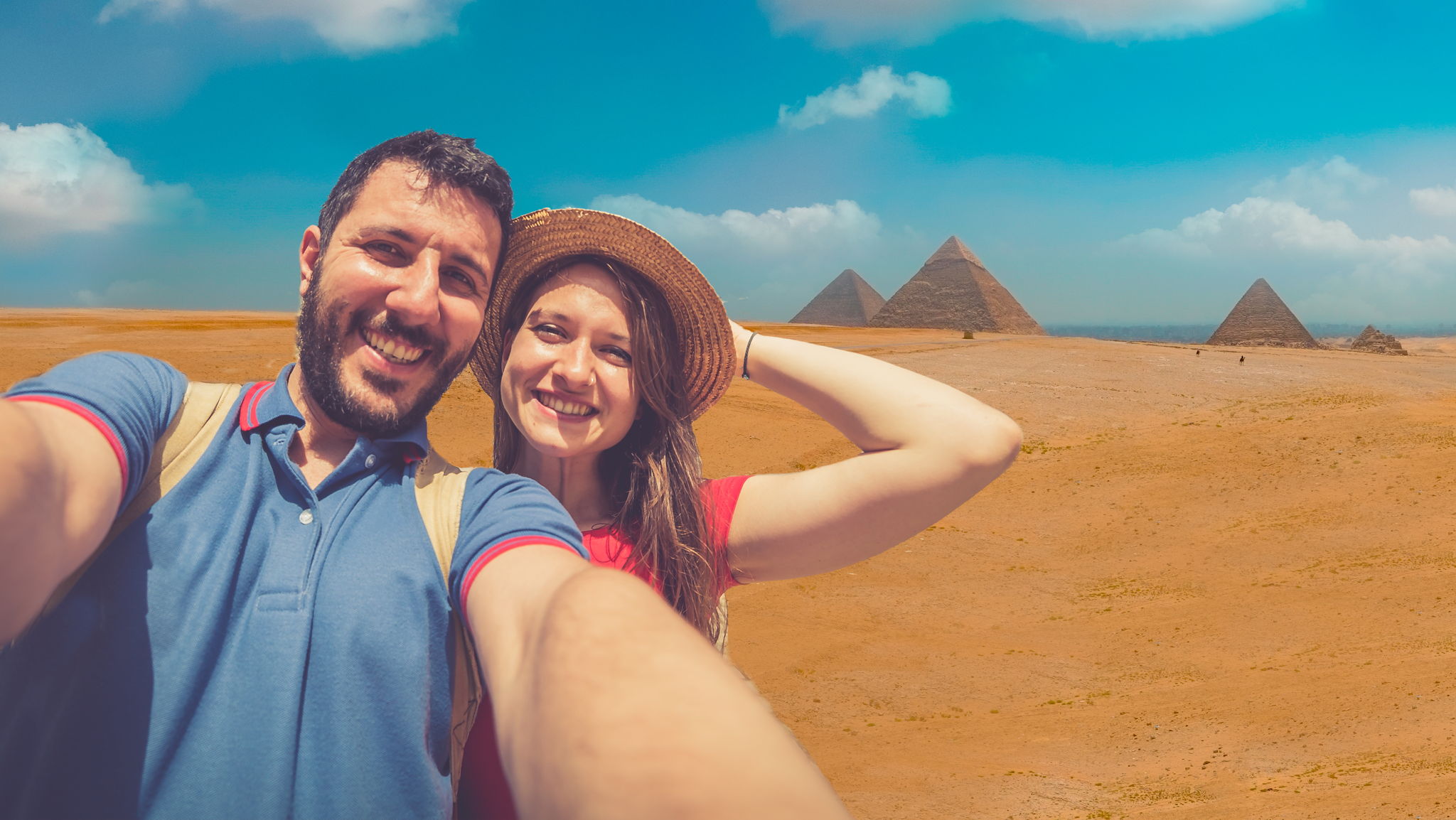 Travellers at the Great Pyramids during an Egypt tour