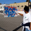 removing graffiti from sign