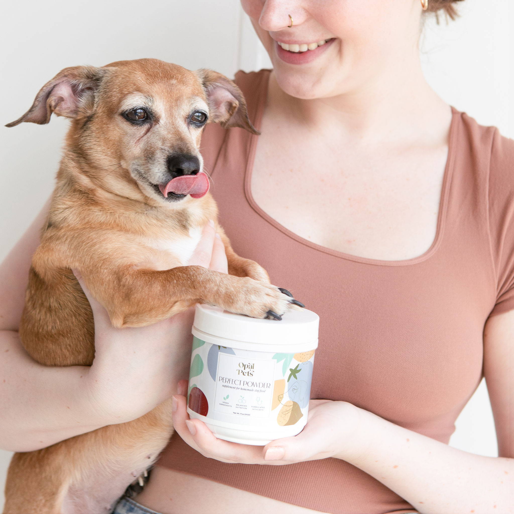 Dog and human with opal pets perfect powder vegan supplement for dogs