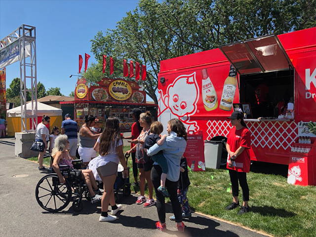 A large group interested in the Kewpie food truck