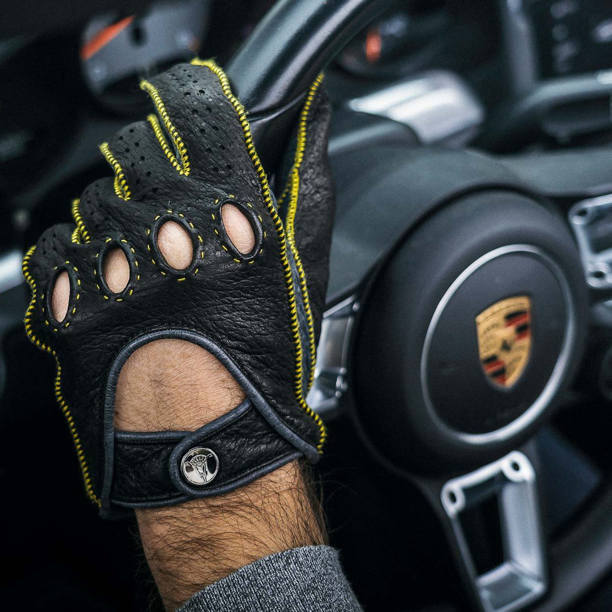 Yellow leather driving gloves