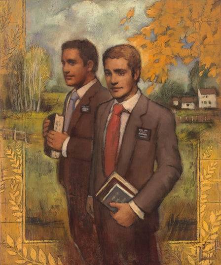 Two young LDS missionary elders standing in front of a field.