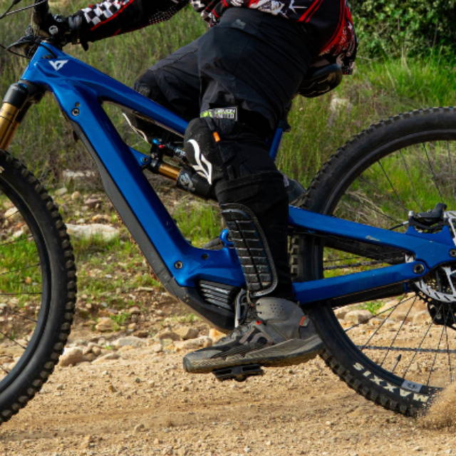 a man riding a full suspension electric mountain bike in the mountains above los angeles