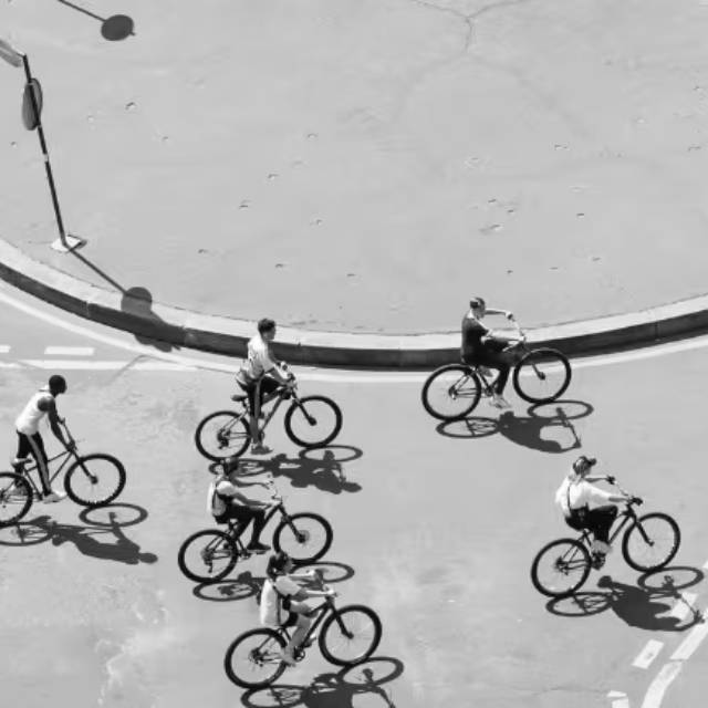 Cyclists on street in Paris France