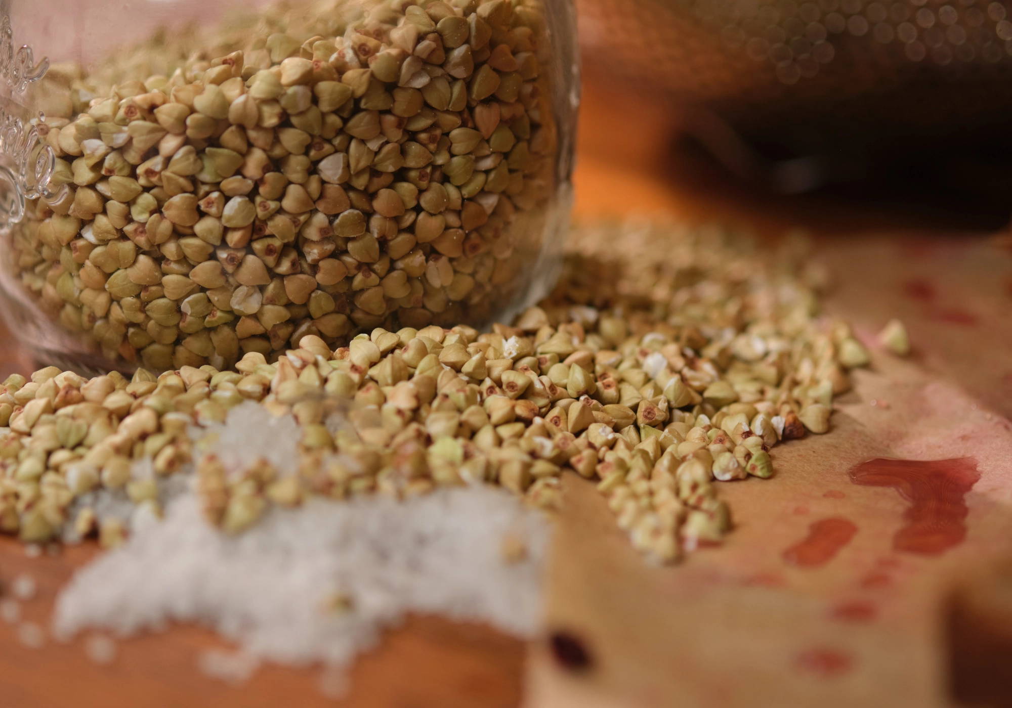 Whole buckwheat groats and sea salt, highlighting PACHA bread's two simple ingredients.