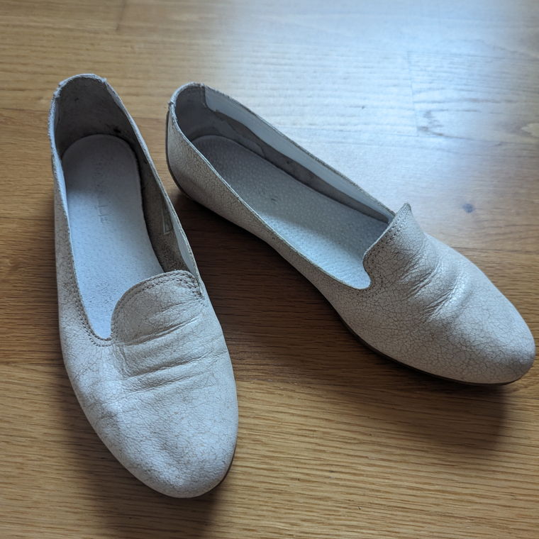 White leather flats