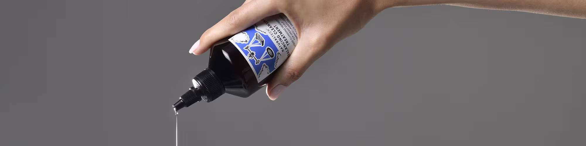 Davines REBALANCING Cleansing Treatment being poured