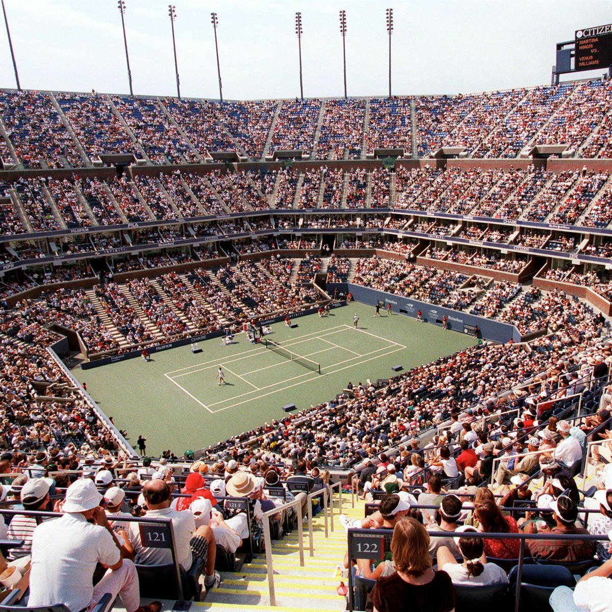 Crowd at a tennis stadium.