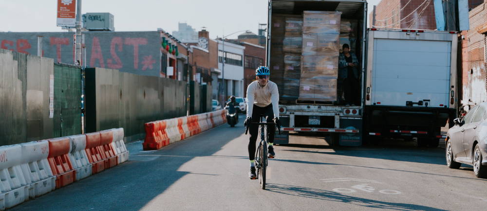 Rider on electric road bike on NYC street bike priority lane