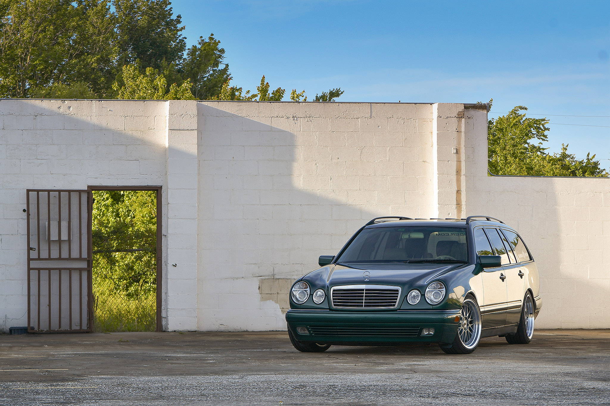 green mercedes E class wagon on gunmetal machined klassik rader pro trak wheels