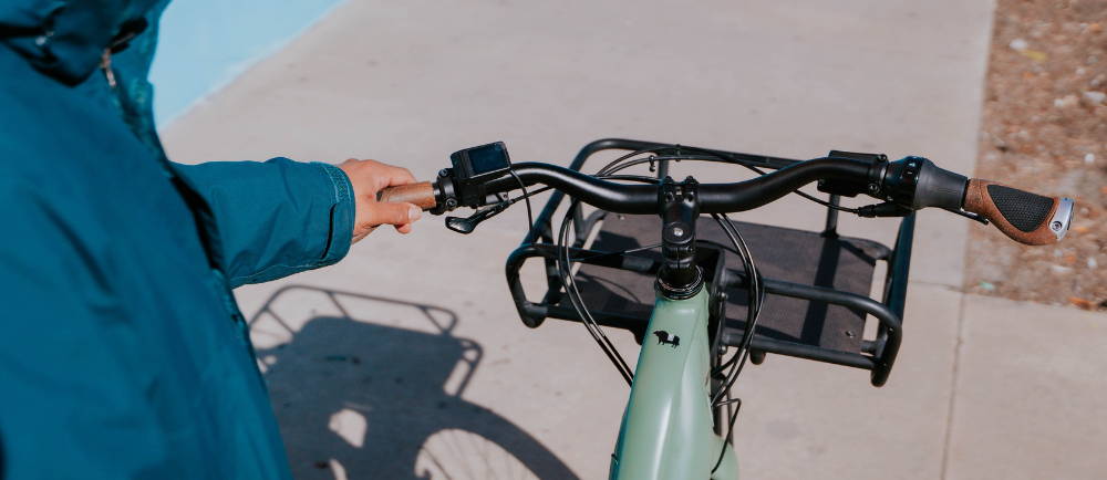 Momentum PakYak+ electric bike on sidewalk