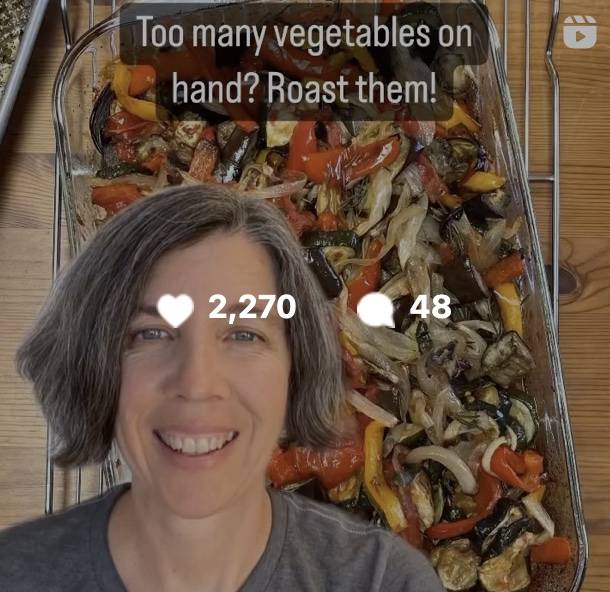 A social media screenshot of person hovering over a bowl of roasted vegetables