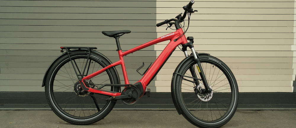 Specialized electric bike red on sidewalk